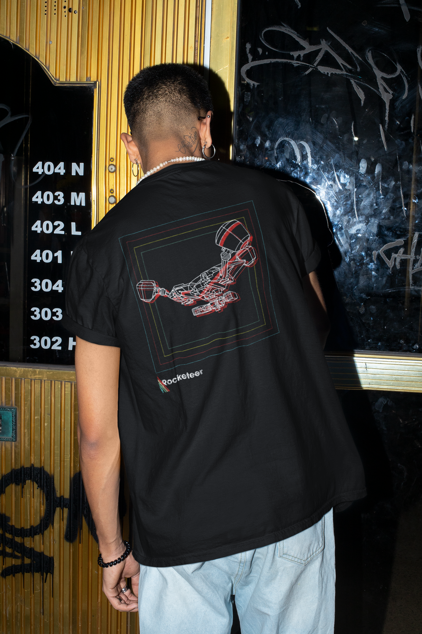 Back view of Arc Raiders inspired ARC Rocketeer t-shirt with retro distressed enemy graphic