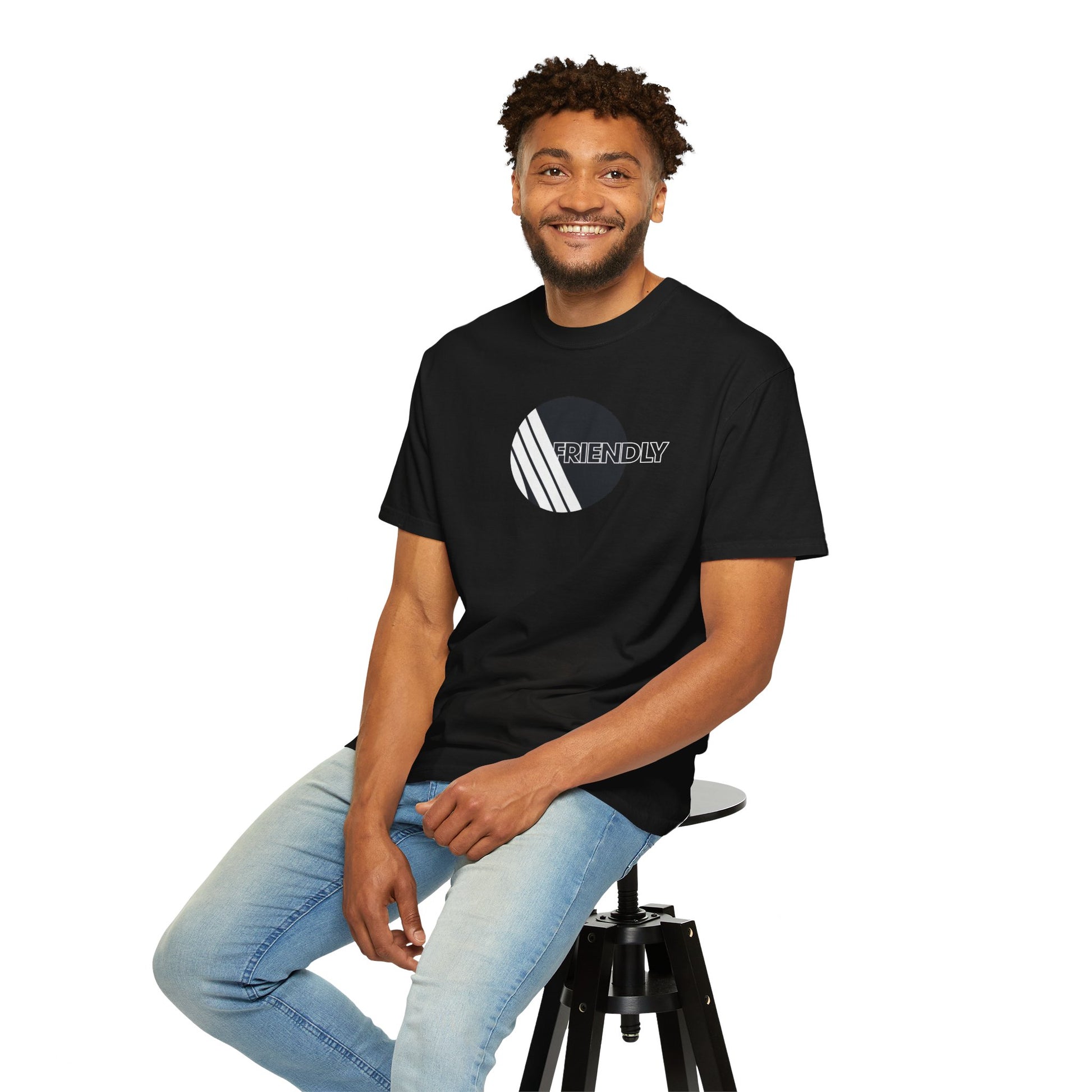 Model seated wearing ARC Raiders Friendly black and white gamer t shirt