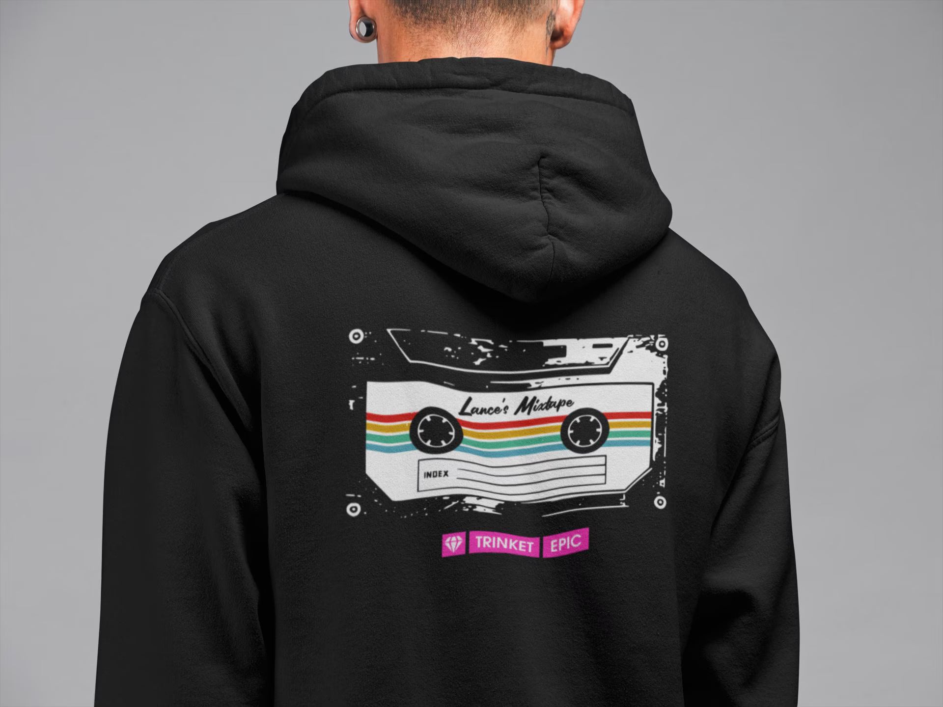 Black Arc Raiders Mixtape hoodie shown on model featuring full cassette artwork on back