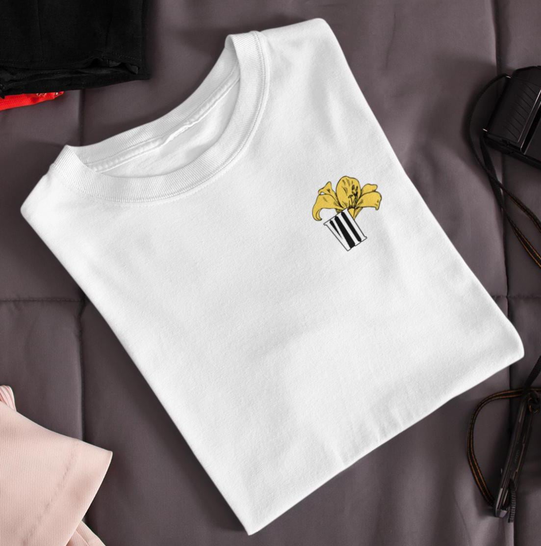 Minimal Final Fantasy VII inspired Aerith flower t-shirt front view pastel colors