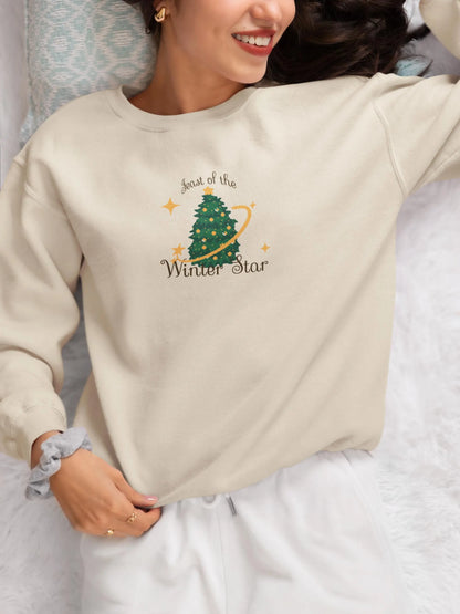 Cream Stardew Valley holiday sweatshirt featuring Feast of the Winter Star design